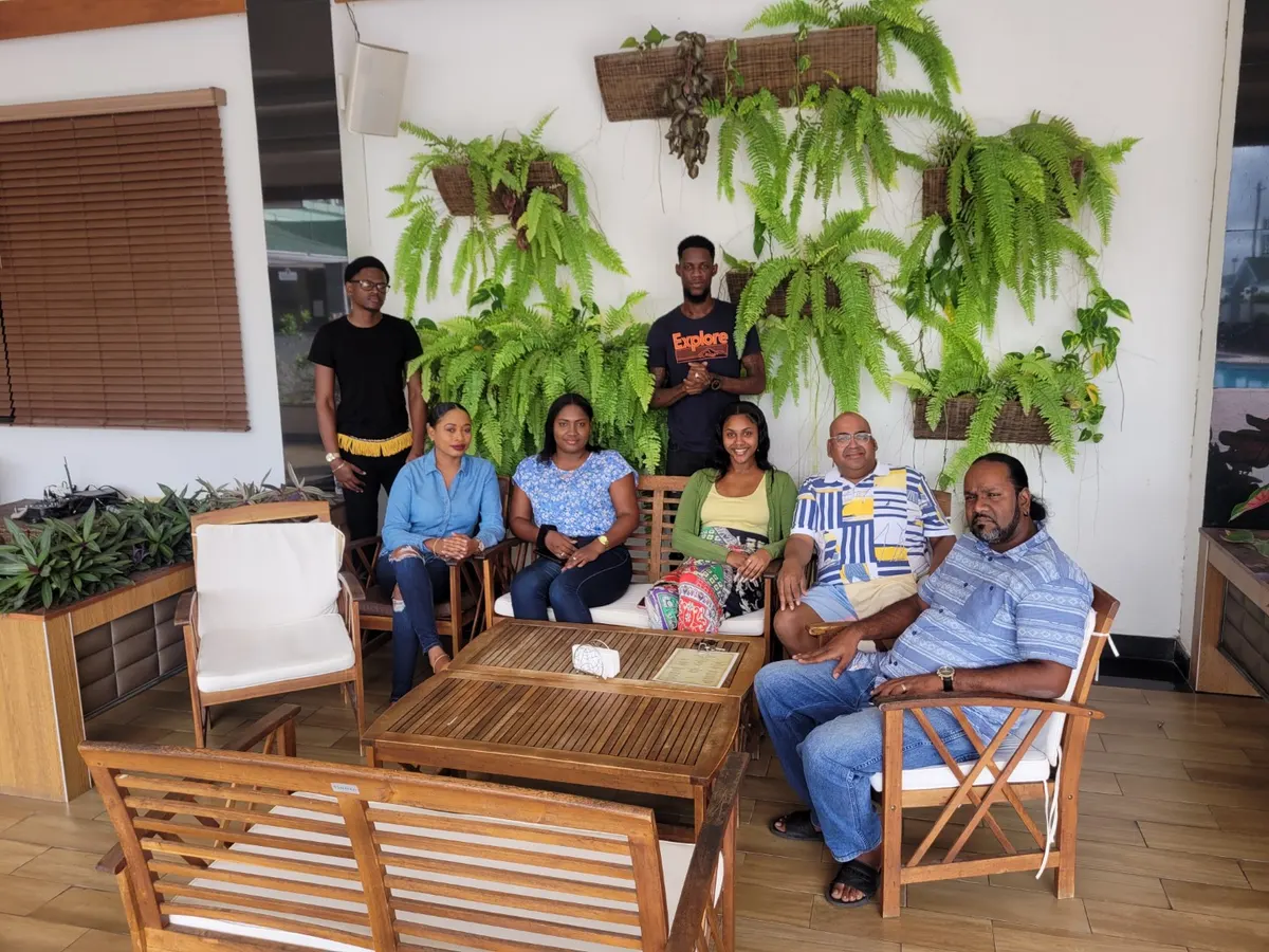 OnCalla team members posing together in a seated group